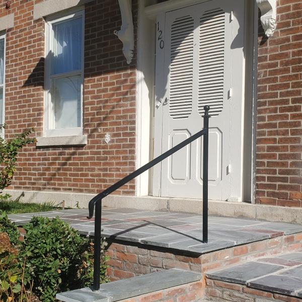 4 foot recreated historical black powder coated railing with a lamb's tongue and decorative ball cap on top.