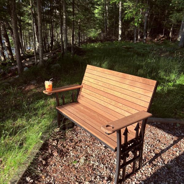 Ipe Bench with wrought iron legs on Lake Superior