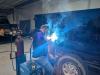 One of our welders working on welding the sideboards on the truck