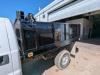 Sideview of the flatbed with new sideboards and a tarp assembly